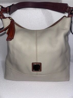 Dooney & Bourke Cream Leather Hobo with Brown Trim and Tassel